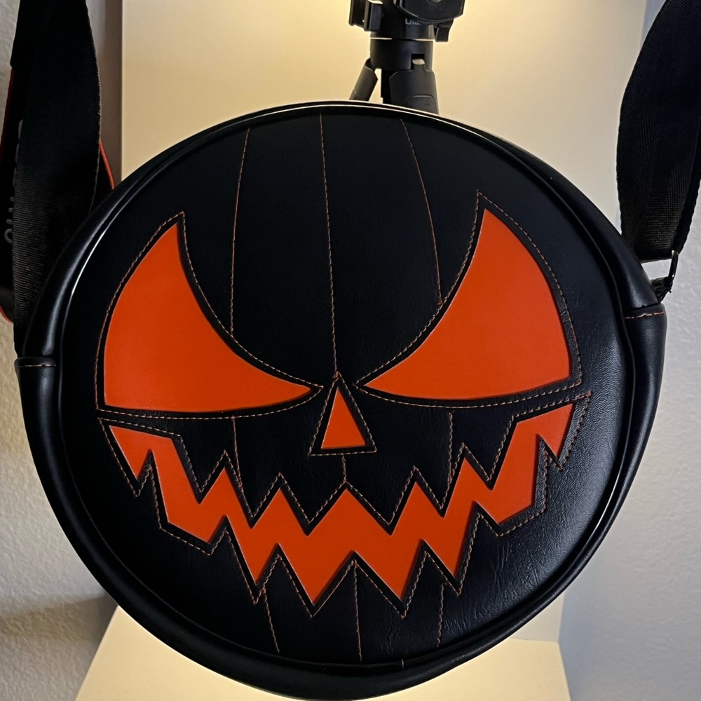 Pumpkin crossbody bags black,orange, and green